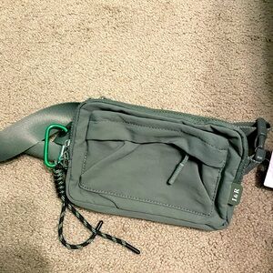 Iris & Rainbow olive green multipocket crossbody bag.